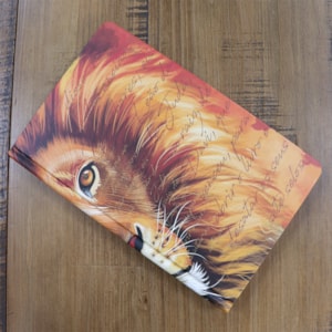 Segunda imagem do produto Bíblia Sagrada 860 | ARC | Letra Normal | Com Harpa Avivada e Corinhos | Capa Leão Laranja